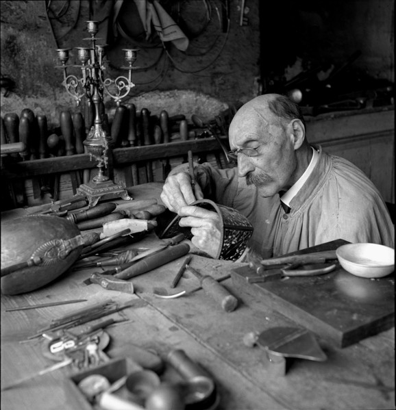 Geneva: artist blacksmith in his studio; 1943.