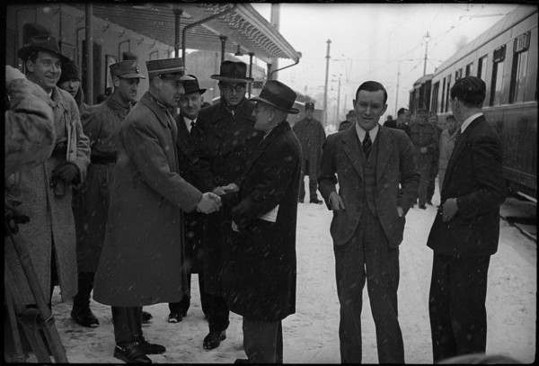 Swiss major Maurer greeting Curri, between them standing in the back Dr. Zuber, second from right: