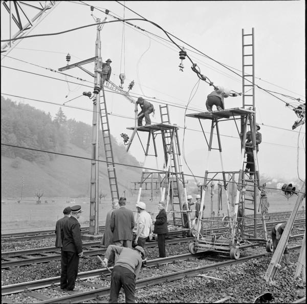 Railway accident in Schwyz; electrician reparing power line 1970.