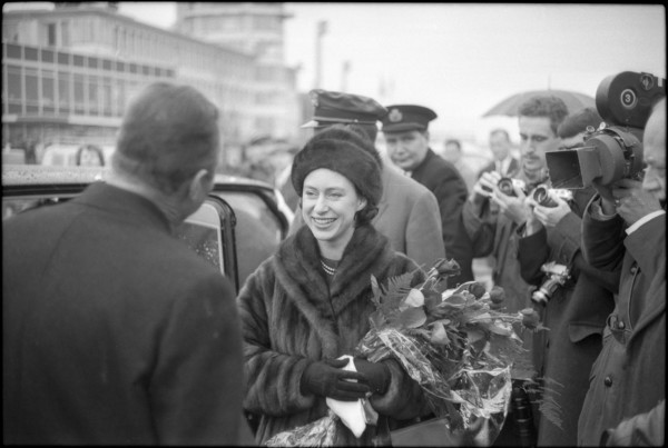 Margaret with the british consul general James Walsh (left); on her way to Davos.