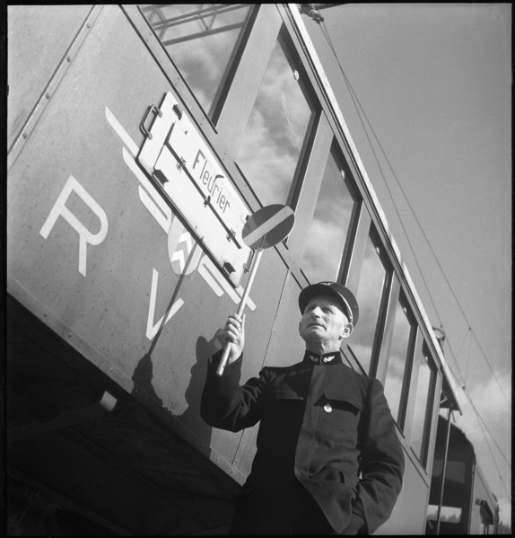 Val de Travers, station manager, train in St.-Sulpice; 1950.