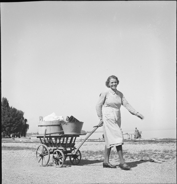 Woman with laundry to wash at Lake Constance, 1944.