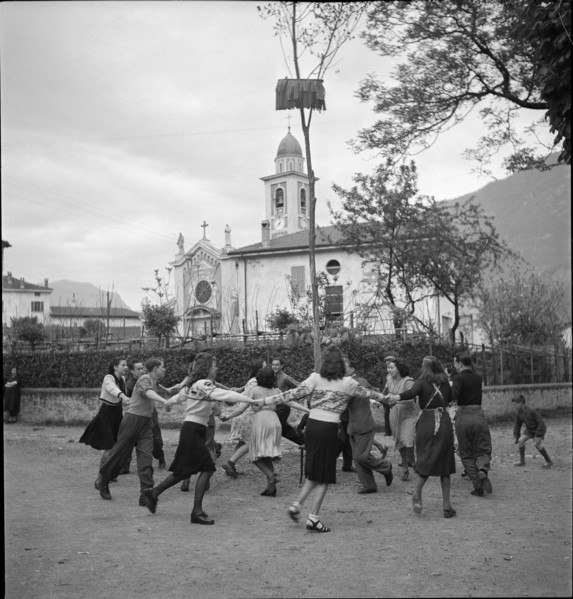 People dance around the maypole in Melide, 1942.