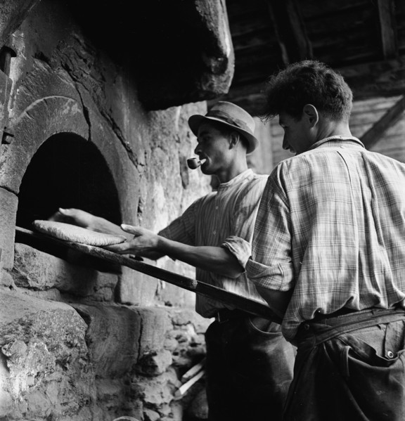 Baking bread in a Valais village, 1941.