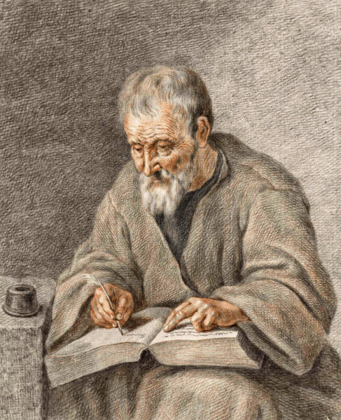 Old man writing notes in a book