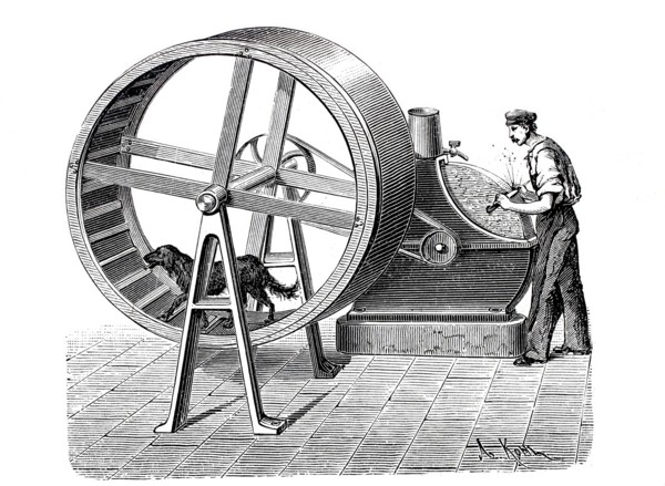 Dog driving a grindstone wheel.
