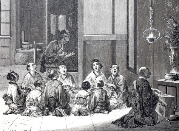 Japanese family gathered for prayer.