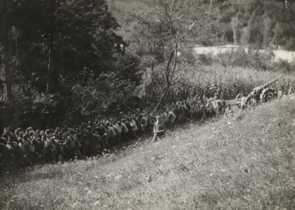 Soldiers towing artillery