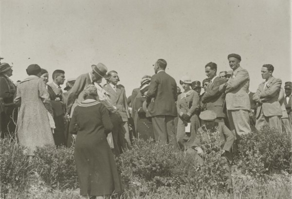 Listening to the guide. 
	
		1924