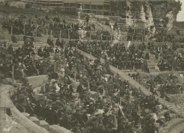 The Greek Theatre of Syracuse packed with people.