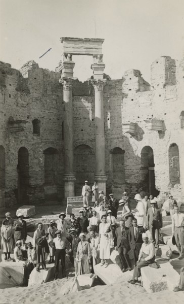 Excursionists in the Basilica of the Severi in Leptis Magna. 
	
		1931