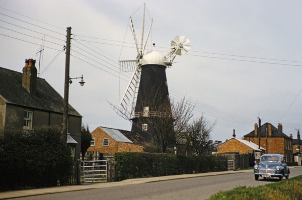 Historic windmill with Morris Minor car, Heckington, Lincolnshire, England, UK early 1960s also