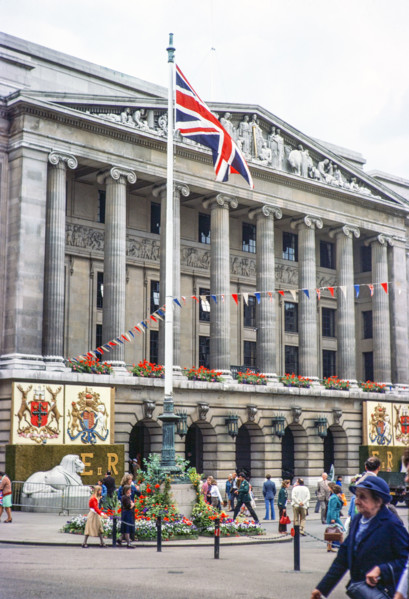 Flags and bunting decorating Council House building for Queen Elizabeth Silver Jubilee celebrations