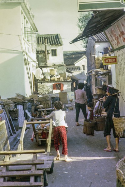 Activity in back alley street, Sai Kung, New Territories, Hong Kong, Asia 1965.