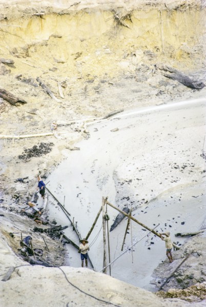 Open Cast gravel-pumping tin mine Malaya, Malaysia, south east Asia 1964 -  high pressure water