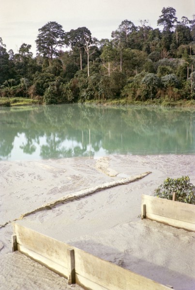 Open Cast gravel-pumping tin mine Malaya, Malaysia, south east Asia 1964 - slurry runs off into