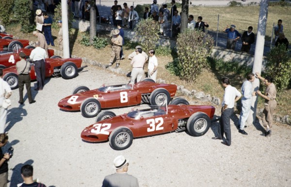 Ferrari Formula One team in  paddock  with sharknose Ferrari 156 F1 cars, Ferraris, Monza Grand