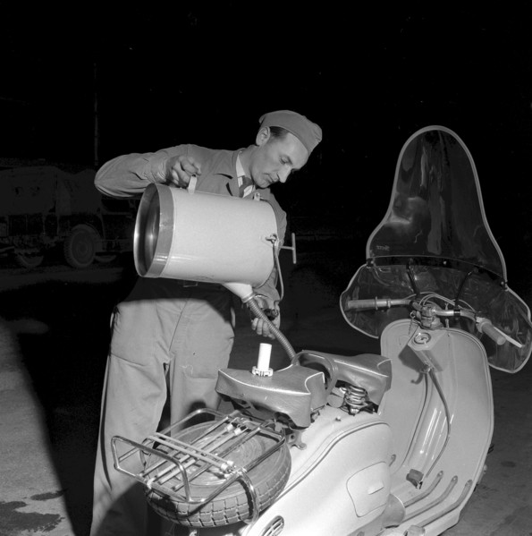 Christmas Eve 1955: petrol pump attendant in Lausanne