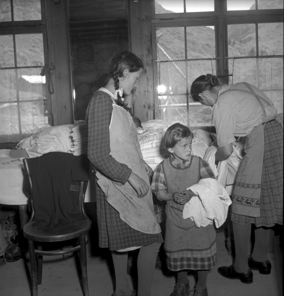 Relief supplies, clothes for the population of the completely burned down hamlet Selva 1949