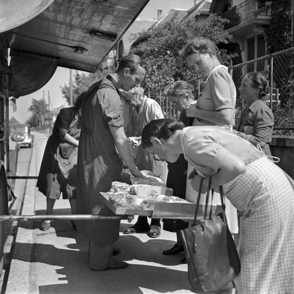 Zurich, Customers shopping in a Migros truck, mobile shop, 1947