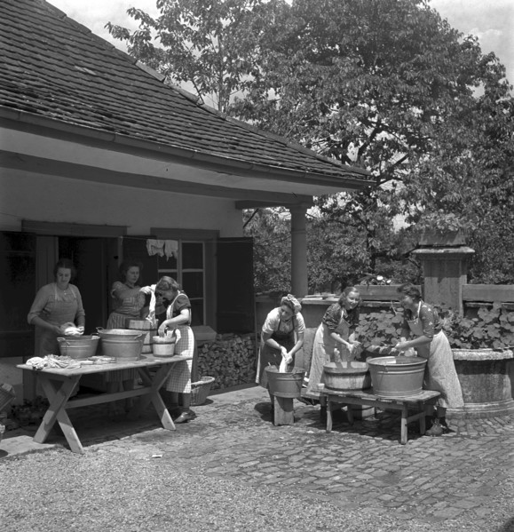 Washing clothes outdoor at women's school 'Heim' in Neukirch an der Thur, 1940