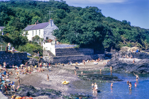 People on beach at Cwm Yr Eglwys.