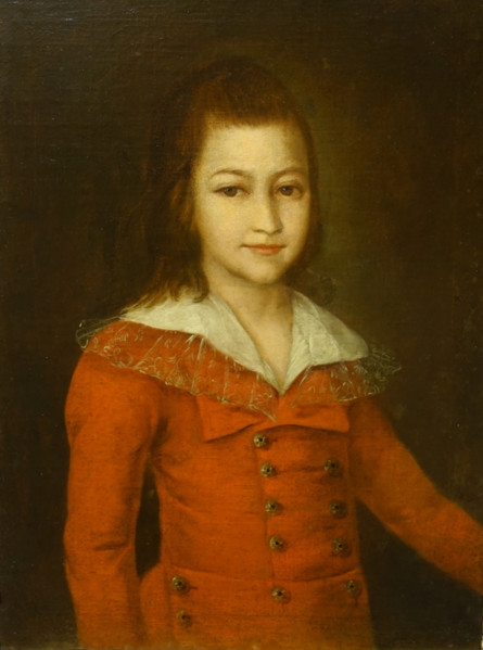 Portrait of a boy in a red caftan