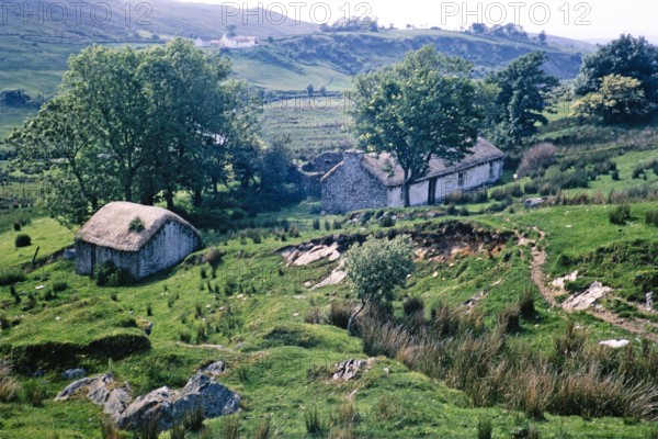 Thatched stone blackhouse traditional croft farmhouse building.
