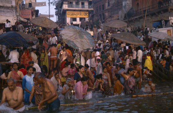 INDIA, Uttar Pradesh, Varanasi, Sivaratri Festival crowd bathing in the River Ganges.