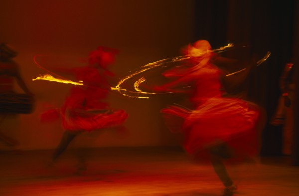 SRI LANKA, Kandy, Kandy dancers in movement blur