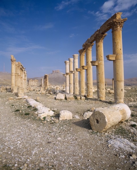 SYRIA, Central, Tadmur, "Palmyra monumental Arch,columns & ruins,some fallen & broken,fort on hill