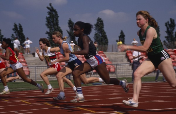 10018120 SPORT Athletics Track Teenage girls in track event in school championships.