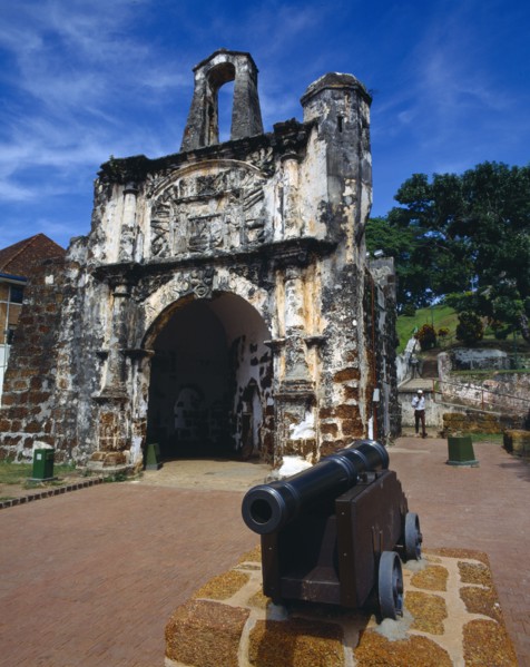 MALAYSIA, Malacca, Porto de Santiago ruined gateway and cannon of Portuguese fort.