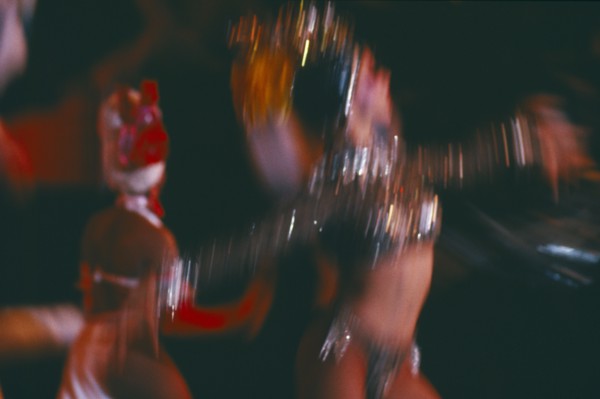 CUBA, Havana Province, Havana, Club Tropicana dancers in blurred movement through long camera