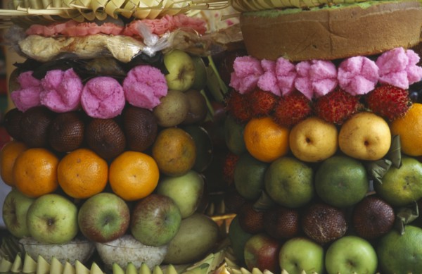 INDONESIA, Bali, Ubud, Temple offerings of fruit arrangements