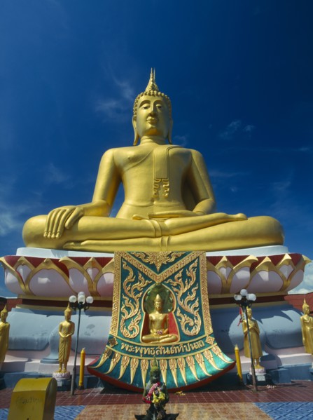THAILAND, North, Koh Samui, Big Buddha Beach. Seated golden Big Buddha statue