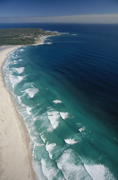 SOUTH AFRICA, Cape Province, Cape Town, View along Noordhoek Beach with waves rolling into the