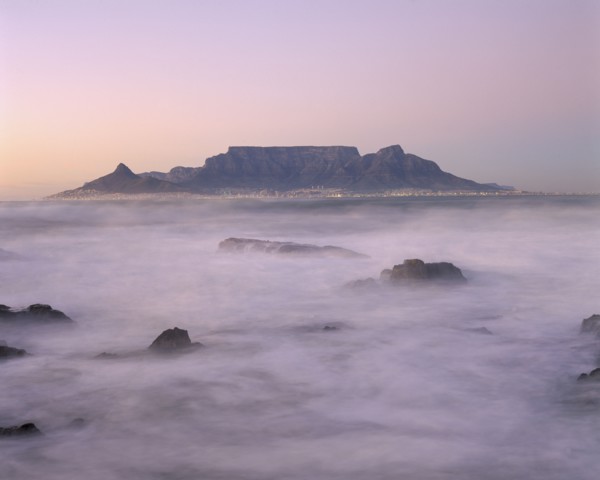 SOUTH AFRICA, Cape Province, Cape Town, View of Table Mountain at dawn taken from Bloubergstrand