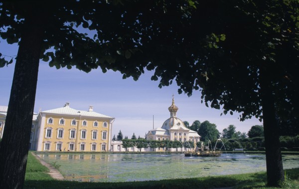 RUSSIA,  , St Petersburg, Puskin palace viewed from under tree branches