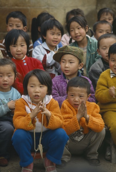 CHINA, Guizhou Province, Zhijin, Crowd of school children.