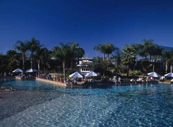 USA, Florida,  Orlando , Seaworld. View across a pool towards visitors gathered along the edge near