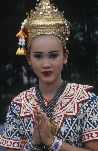 THAILAND, Bangkok, Erewan Shrine Temple Dancer giving a traditional Thai Wai greeting