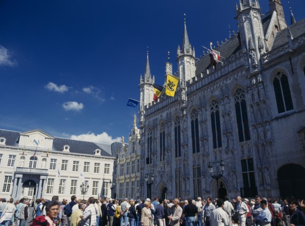 BELGIUM, West Flanders, Bruges, Burg Square with tourists outside the Stadhuis