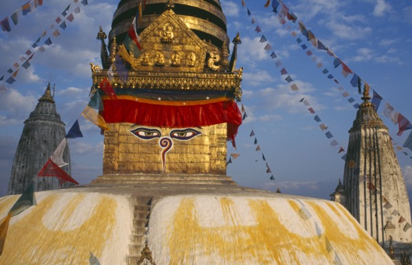 NEPAL, Kathmandu Valley, Swayambhunath, Swayambhunath Temple.  Detail of roof dome with painted
