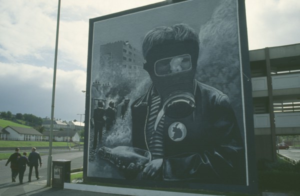 IRELAND,  North  , Derry, Nationalist mural depicting a boy wearing a Gas Mask on the Bogside.