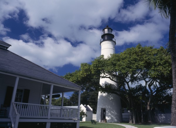 USA, Florida, Key West , Lighthouse Museum seen behind tree