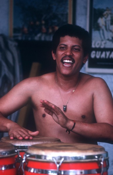 CUBA, Music, Salsa musician playing red drums with his hands