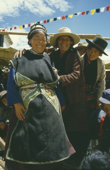 TIBET, Samye, People, Group of laughing women at Full Moon Festival