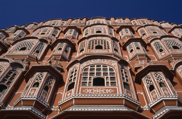 INDIA, Rajasthan, Jaipur, Palace of the Winds aka Hawa Mahal. View looking up the pink and white