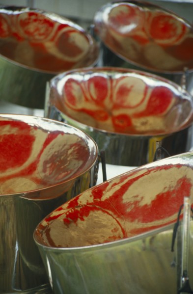 WEST INDIES, Tobago, Detail of steel band drums with red reflections